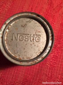 Cajas y cajitas metálicas: Antiguo tarro de lata de la casa Nestle años 50-60
